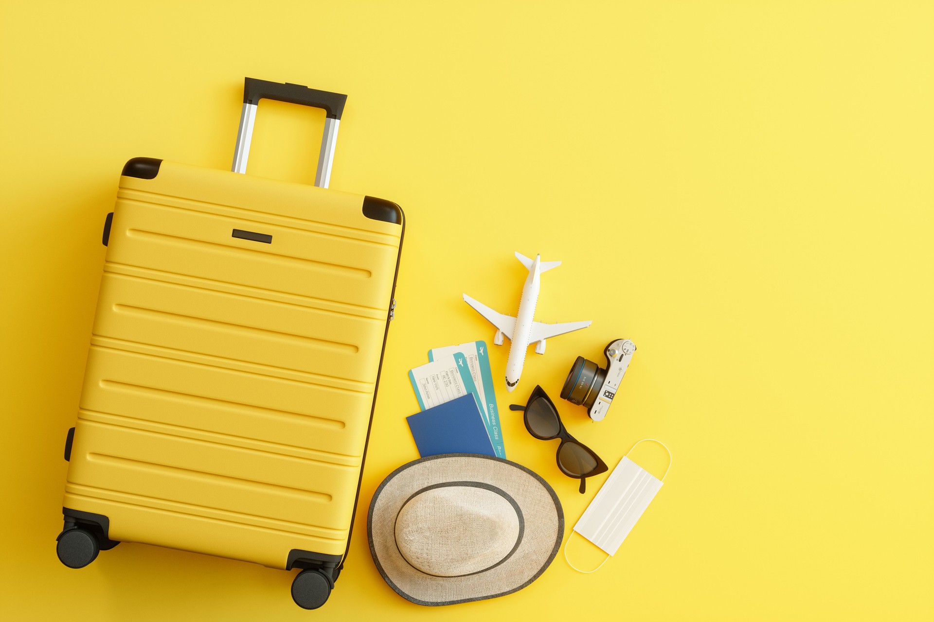 Medical Mask, Suitcase with Sun Hat, Camera, Passport, Airplane Ticket, Sunglasses and Airplane on Yellow Background